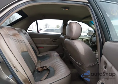 2002 Buick Century Custom z USA, uszkodzony, nr VIN 2G4WS52J121144408